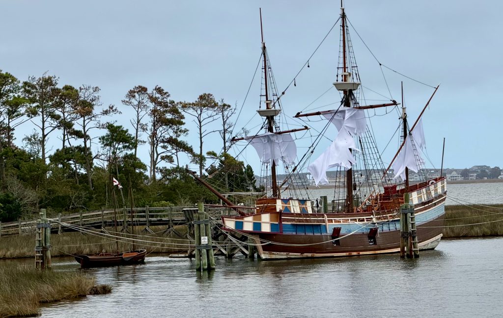 The replica ship Elizabeth II at Manteo with white sheets hung in her rigging